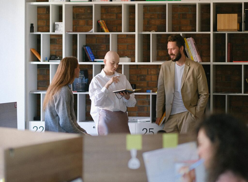 Photo by Anna Shvets: https://www.pexels.com/photo/businesspeople-discussing-project-in-modern-workplace-5324900/  